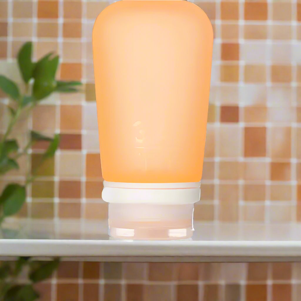 Humangear- 3.4 oz GoToob+ Silicone Toiletry 3-1-1 Bottle (LARGE) Orange