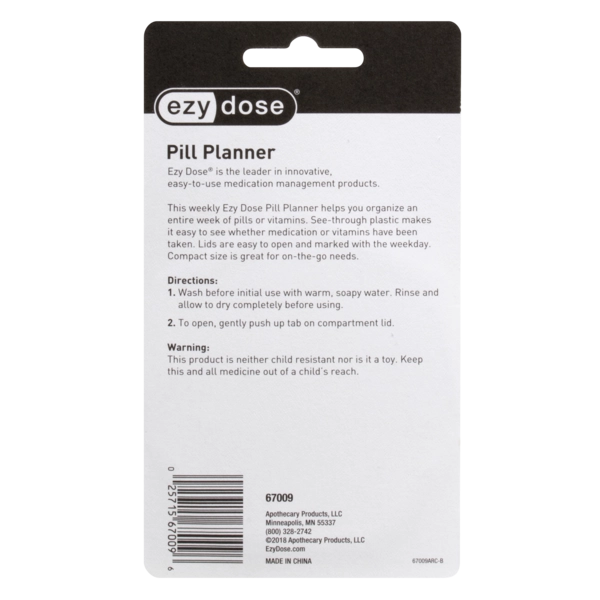 A weekly EzyDose Pill Planner card packaging, featuring a black and white design with product details, directions, and warnings printed on the front.