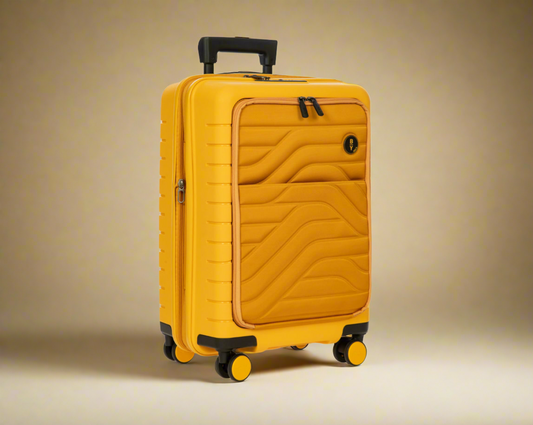 Bric’s B|Y Ulisse 21” Hardsided Expandable Hybrid Carry-on Spinner with Pocket Mango Yellow