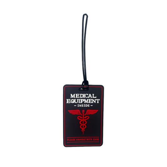#Luggage tag with 'Medical Equipment Inside' text and caduceus symbol on a black background. "Medical Equipment Inside Please Handle With Care."