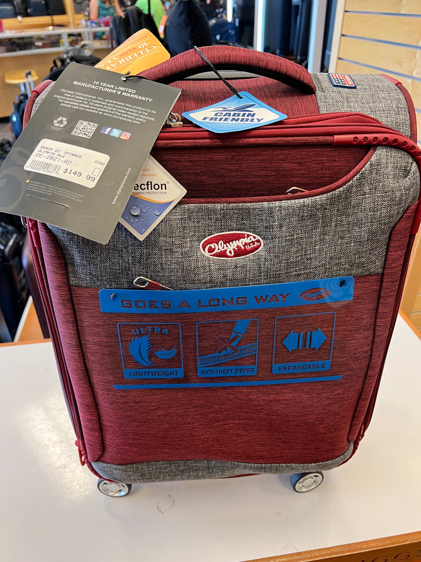 FINAL SALE - Olympia Denim 22” Carry-On Softside Spinner (Red)- OE-2621