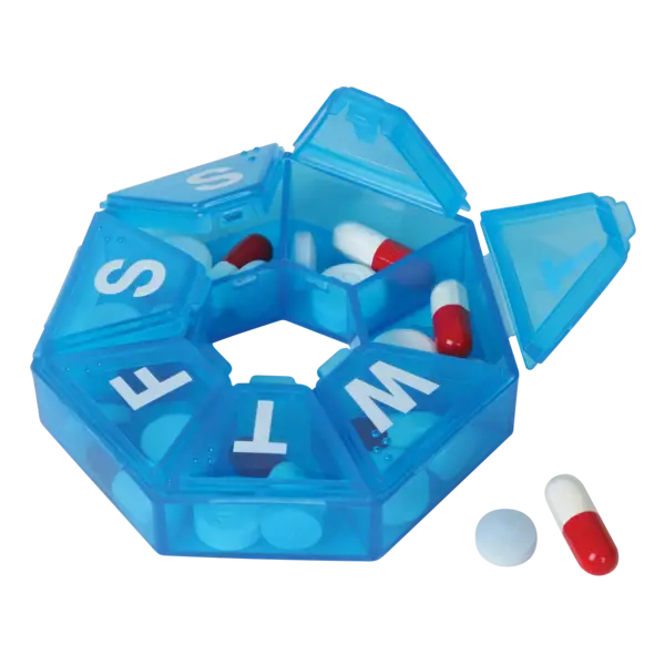 A translucent blue weekly pill organizer box with seven compartments labeled S, M, T, F, S, M, and W, shown open with capsules and tablets inside on a white background.