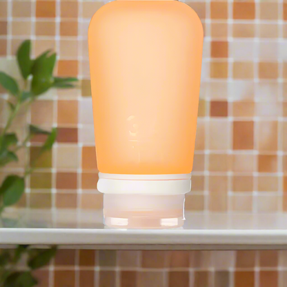 Humangear- 3.4 oz GoToob+ Silicone Toiletry 3-1-1 Bottle (LARGE) Orange