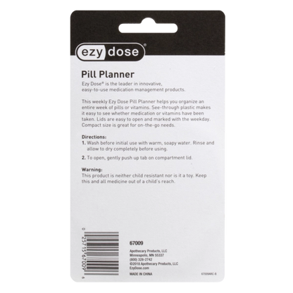 A weekly EzyDose Pill Planner card packaging, featuring a black and white design with product details, directions, and warnings printed on the front.