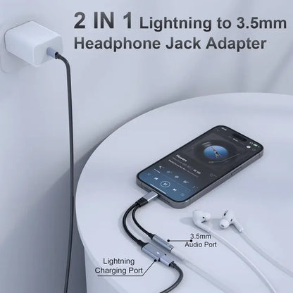 2 in 1 lightning to 3.5 mm headphone jack adapter. Depicts Lightning Charging Port and 3.5 mm Audio Port. 