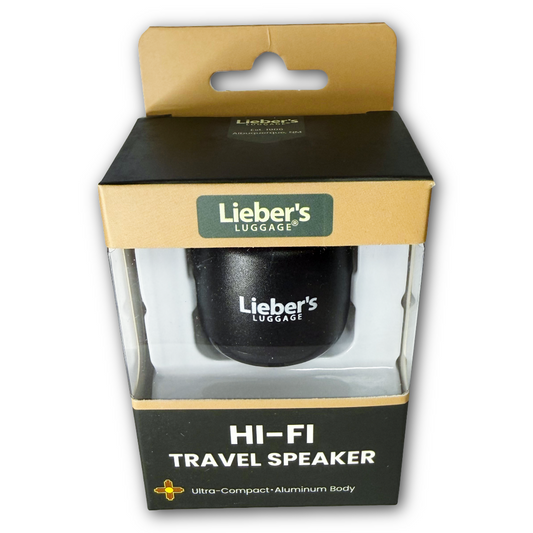 Lieber's Luggage Hi-Fi Travel Speaker in its original retail packaging, featuring a black speaker inside a clear plastic window box with a gold and black cardboard hanger.