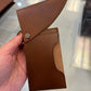 Funda tipo billetera de cuero Bosca Italio Flipper (marrón claro)